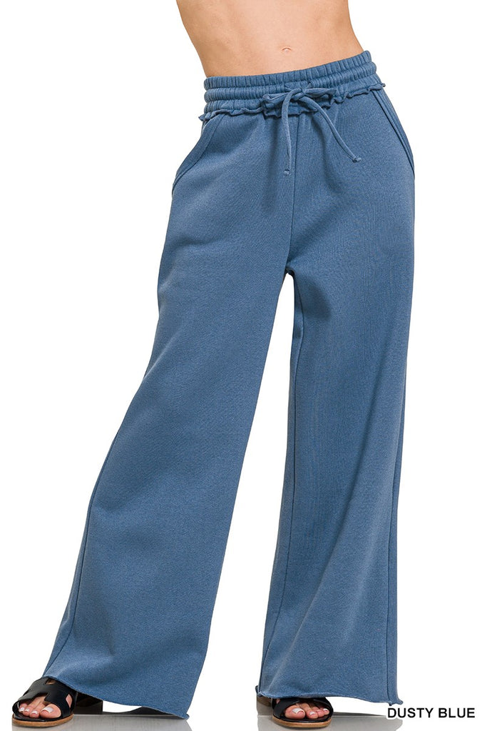 Dusty blue wide-leg pants on a white background