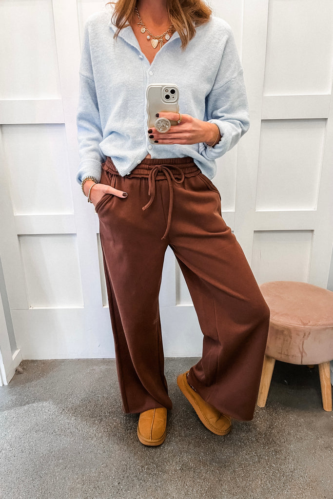 wide leg fleece sweatpants with elastic waistband and raw hem