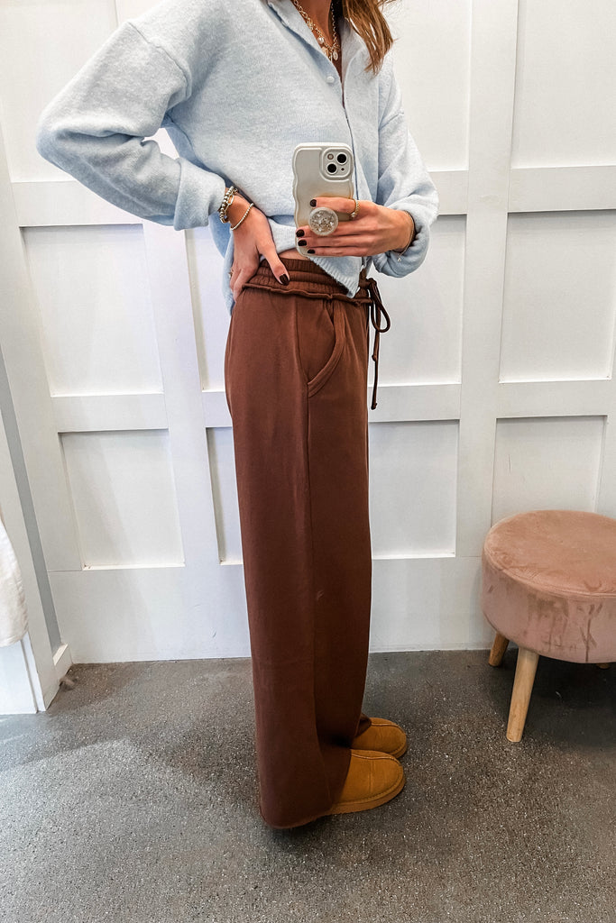 wide leg fleece sweatpants with elastic waistband and raw hem