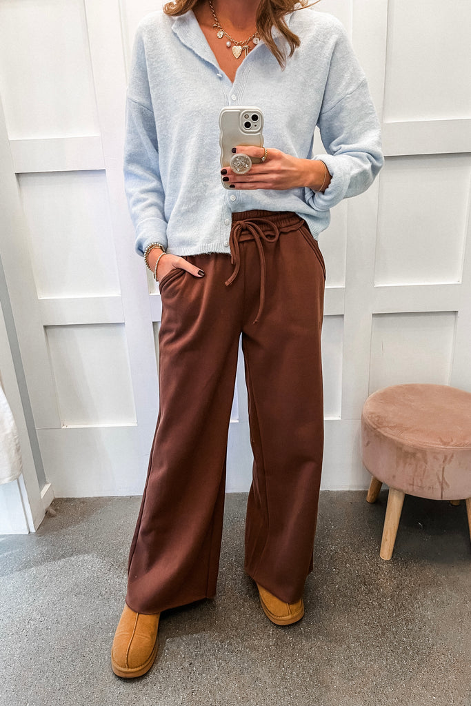 wide leg fleece sweatpants with elastic waistband and raw hem