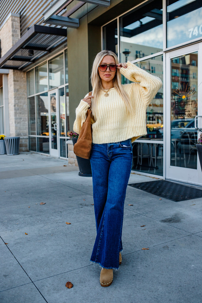 yellow chunky sweater