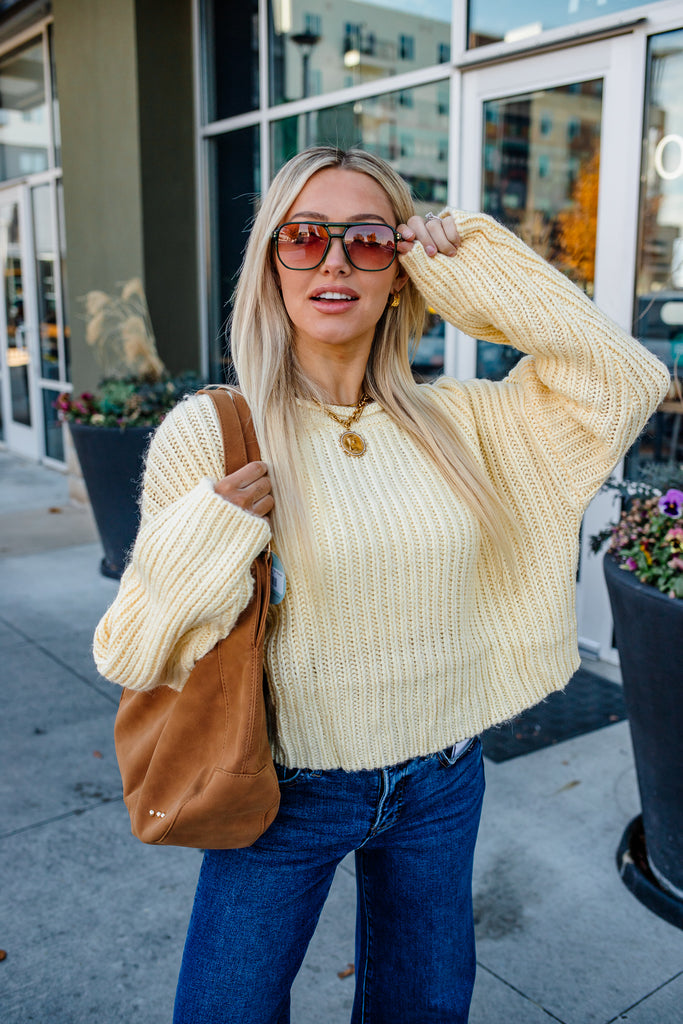 yellow chunky sweater