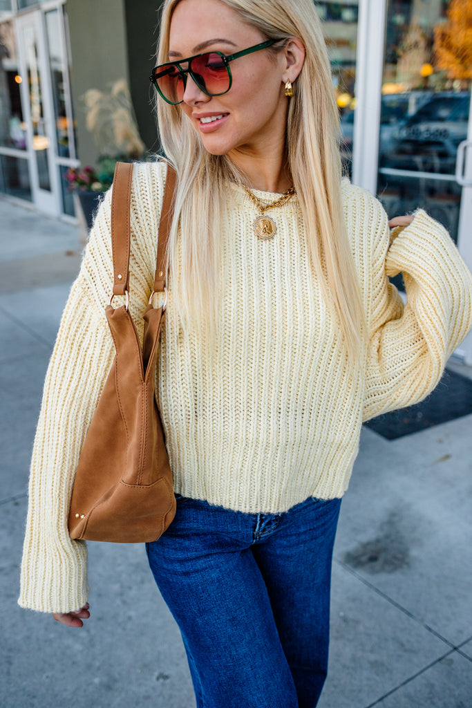 yellow chunky sweater