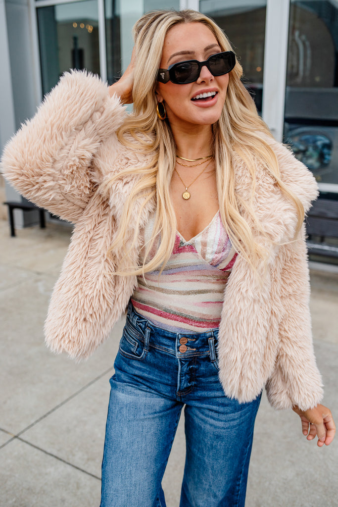 tan faux fur coat
