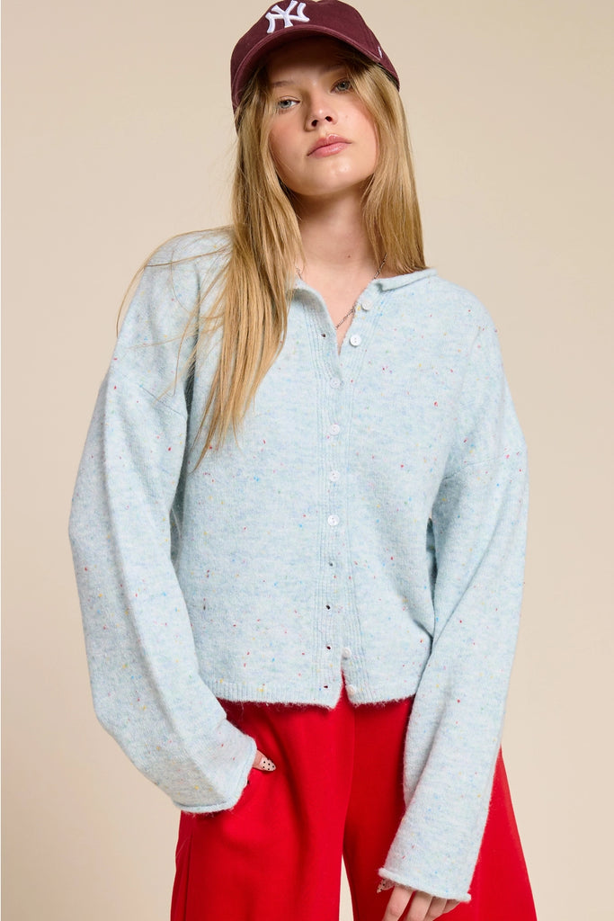 light blue speckled cardigan with button front and relaxed fit